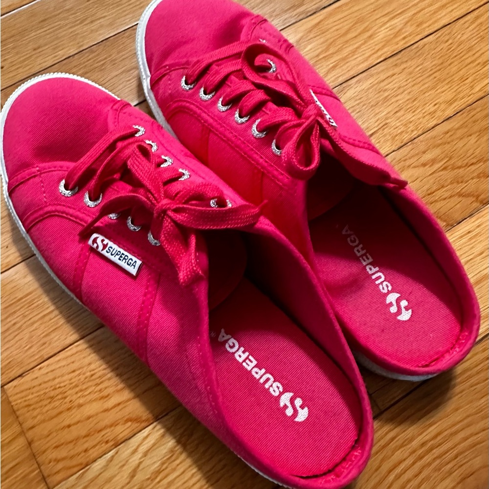 Hot pink Superga slide on sneakers.